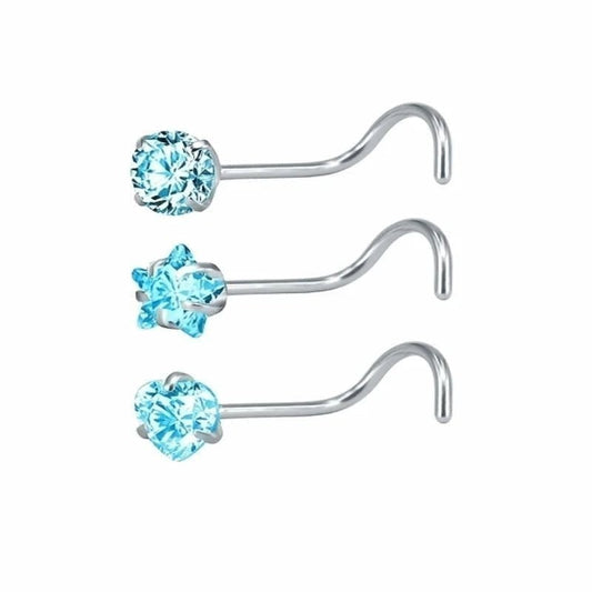 Aramat Jewels blue zirconia nose stud with a S-shaped steel bar. Available in round, star, and heart shapes.