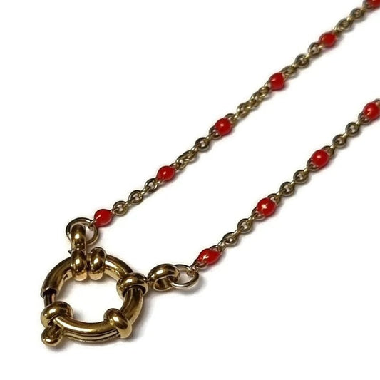 Aramat Jewels gold-tone stainless steel chain necklace with small red enamel beads and a large toggle clasp.