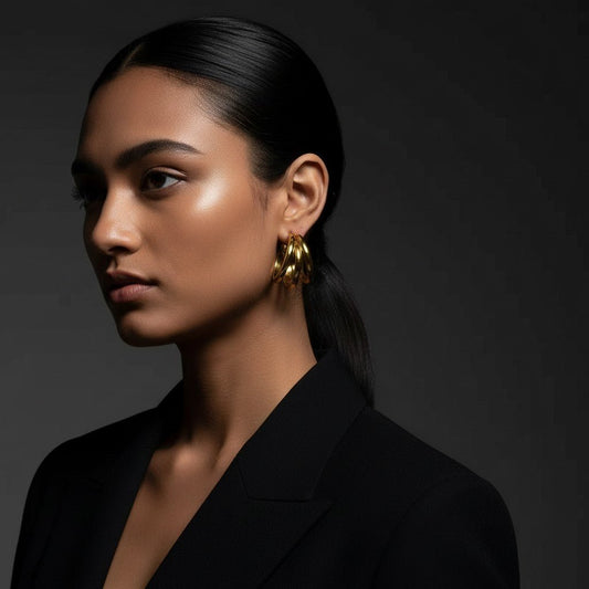 Goudkleurige 3 - Lijns Halve Oorringen 24x9,5mm Twist RVS - Aramat Jewels - Oorbellen - cadeautip