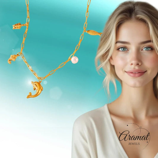 Goudkleurige damesketting met zee - bedels & parel – 45 cm - ket1175 - 511146 - Halskettingen kopen# - 45cm - alles - Bedelketting