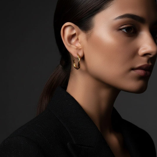 Goudkleurige Gedraaide Halve Oorringen 30x4mm RVS - Aramat Jewels - Oorbellen - cadeautip