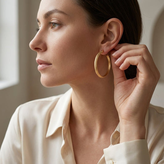 Goudkleurige Matte RVS Oorringen Sandblasted - 32 mm - Aramat Jewels - Oorringen - cadeautip