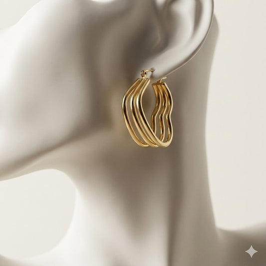 Goudkleurige Triple Hart Oorringen 25mm - Aramat Jewels - Oorringen - cadeautip