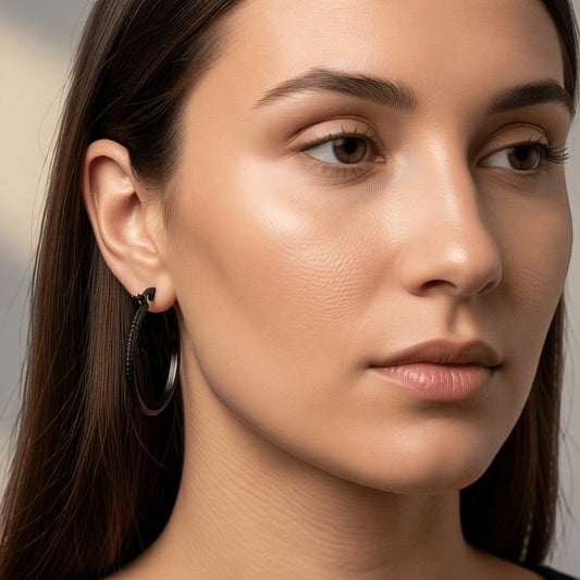 Zwarte RVS Oorringen met Puntjes Motief 25mm - Aramat Jewels - Oorringen - cadeautip