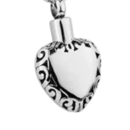 Heart pendant with a decorative edge – silver-colored