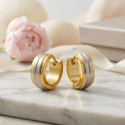 Aramat Jewels stainless steel bicolor hoop earrings, 13x5mm, with matte silver and gold stripes. Modern unisex design.