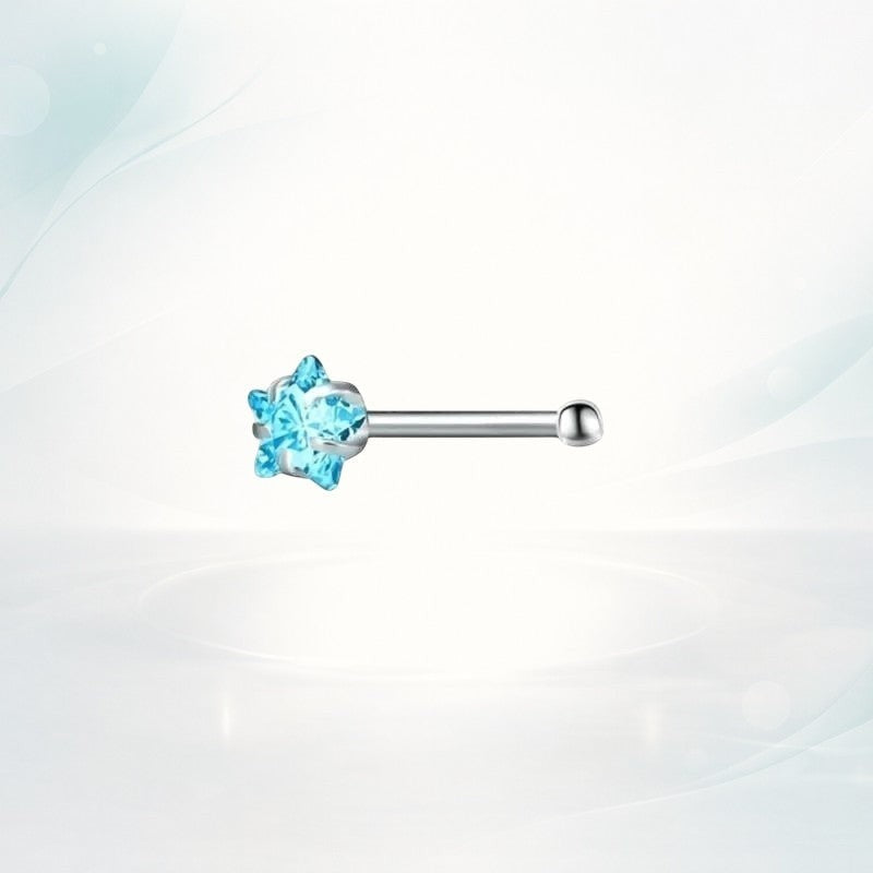Aramat Jewels silver-tone nose stud with a blue zirconia stone and a straight bar.