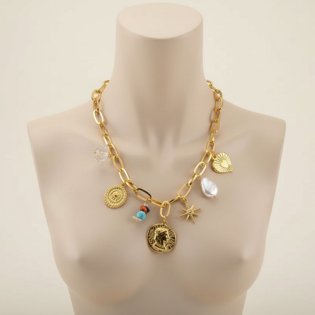 Aramat Jewels gold-tone stainless steel necklace with pearl, crystal, coin, heart, star, and beaded charms. 45+5 cm adjustable length.