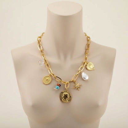 Aramat Jewels gold-tone stainless steel necklace with pearl, crystal, coin, heart, star, and beaded charms. 45+5 cm adjustable length.