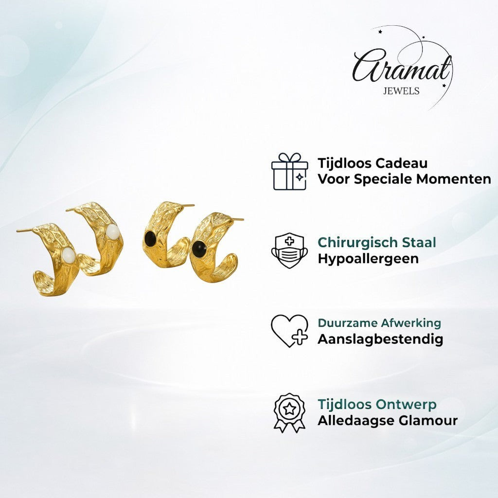 Aramat Jewels gold-tone hoop earrings with textured finish and a white or black enamel circle detail. Approx. 25x10mm.
