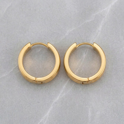 Aramat Jewels gold-tone stainless steel huggie hoop earrings with triple stripe detail, 13mm or 20mm diameter.
