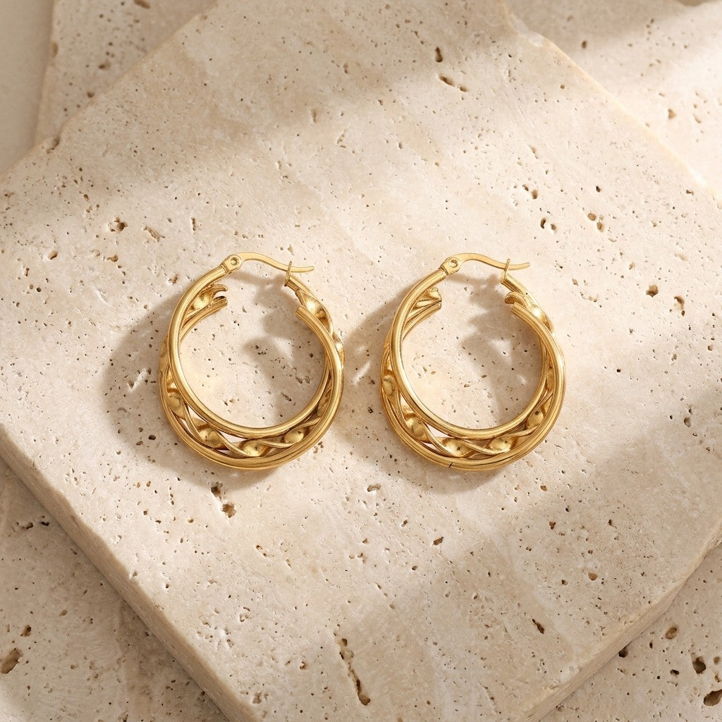 Aramat Jewels gold triple hoop earrings, 30x7.5mm, featuring two smooth and one twisted ring with beaded detail.