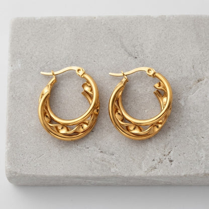 Aramat Jewels gold-tone stainless steel triple hoop earrings with twisted detail, 20x7mm.