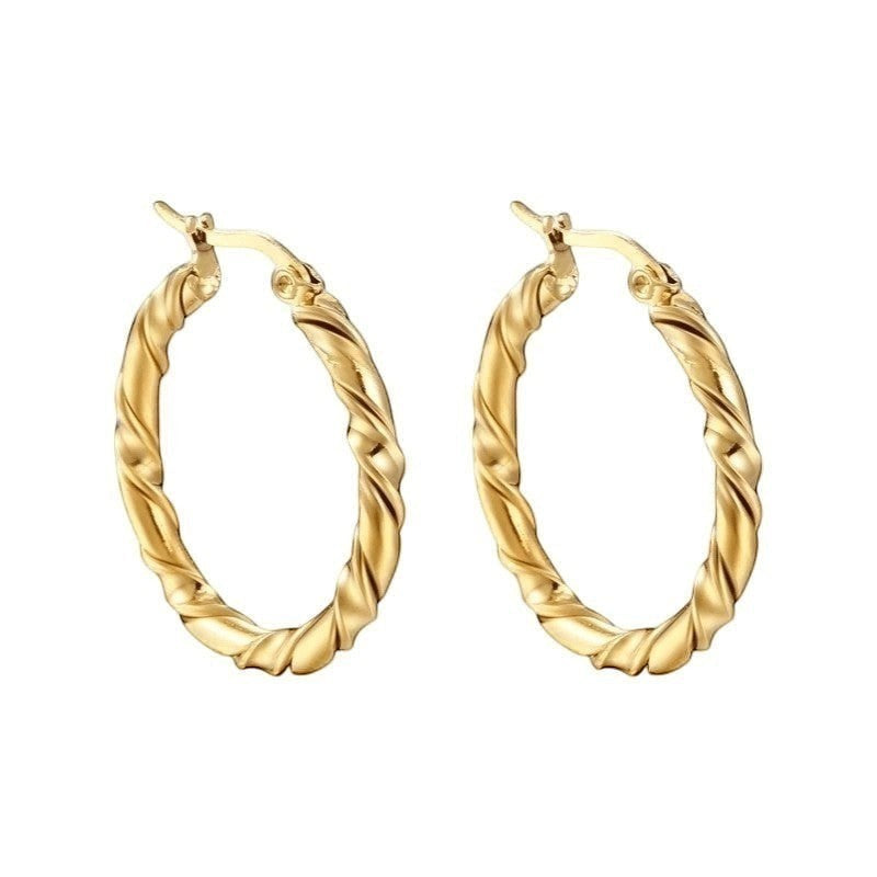 Aramat Jewels gold-colored stainless steel twisted hoop earrings, 35mm diameter, swirl design, for women.