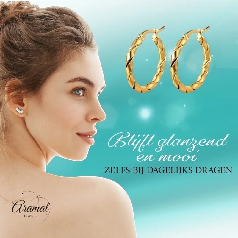 Aramat Jewels gold twisted hoop earrings, 25mm or 45mm, made of stainless steel. Model shown from the side.