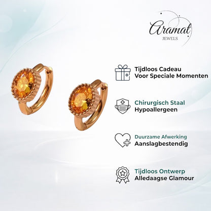 Aramat Jewels gold-tone mini hoop earrings with oval yellow cubic zirconia stones and beaded detail.