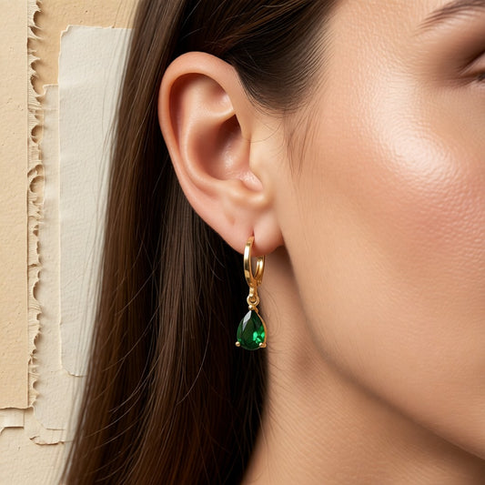 Aramat Jewels gold-colored mini hoop earrings with a green teardrop zirconia, 10mm diameter.