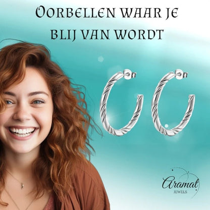 Aramat Jewels zilverkleurige halve twisted hoepel oorbellen van RVS met een gedraaid design van 30mm diameter.