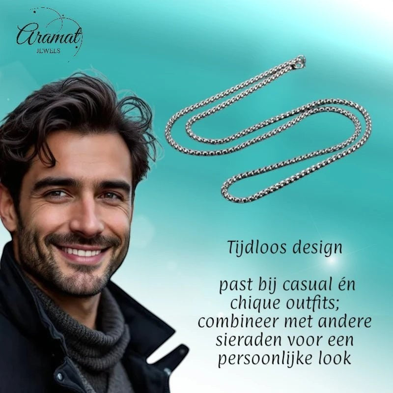 Aramat Jewels zilverkleurige 5mm jasseron schakelketting van roestvrij staal gedragen door een man voor een stoere look.