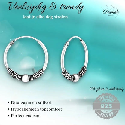 Aramat Jewels 18mm oxidized silver hoop earrings with ethnic Bali design. Hypoallergenic and durable.