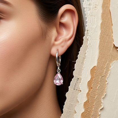 Aramat Jewels silver hoop earrings with a pink pear-shaped zirconia drop for girls.