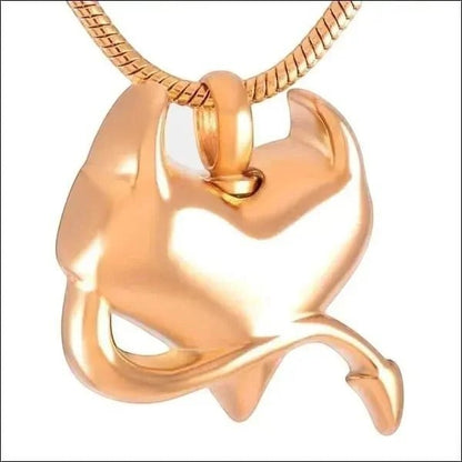 Aramat Jewels rose gold stainless steel heart pendant with devil motif and screw closure. Unique memorial jewelry.