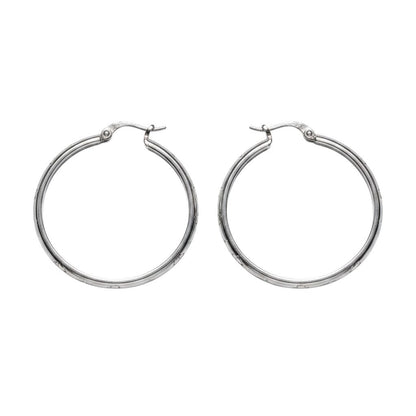 Aramat Jewels silver-tone stainless steel hoop earrings with anchor motif, 35mm diameter.