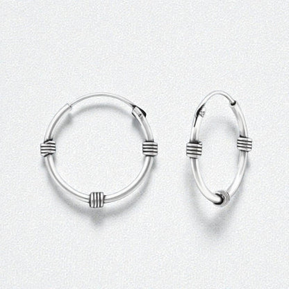 Aramat Jewels unisex silver Bali hoop earrings, 16mm diameter, with traditional banded design. Timeless and versatile.