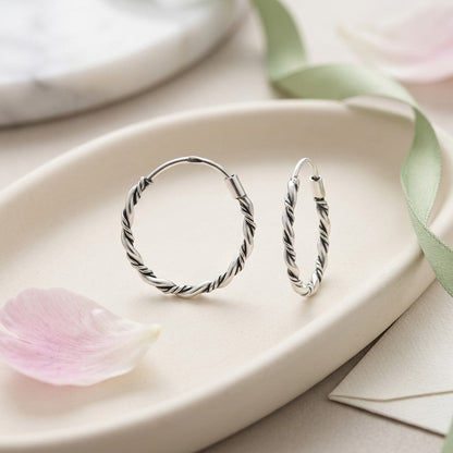 Aramat Jewels small twisted silver Bali hoop earrings, 16mm diameter, perfect for everyday or special occasions.