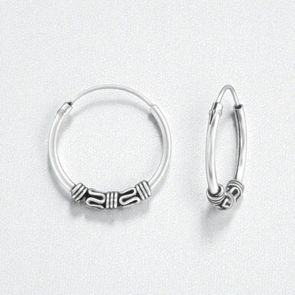Aramat Jewels unisex silver Bali hoop earrings, 16mm diameter, with intricate tribal bead details.