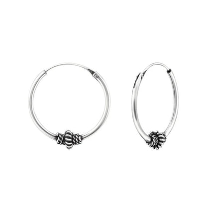 Aramat Jewels silver Bali hoop earrings, 18mm diameter, with intricate ethnic bead detail. Oxidized silver finish.
