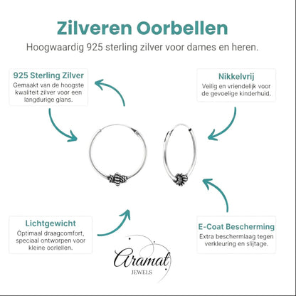 Aramat Jewels 18mm silver Bali hoop earrings with ethnic design and oxidized finish. Nickel-free 925 sterling silver.