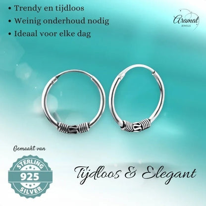 Aramat Jewels unisex 16mm silver Bali hoop earrings with intricate tribal detailing. Timeless and elegant design.