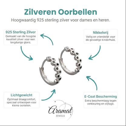 Aramat Jewels silver hoop earrings with black zirconia stones, 12mm diameter, nickel-free and lightweight.