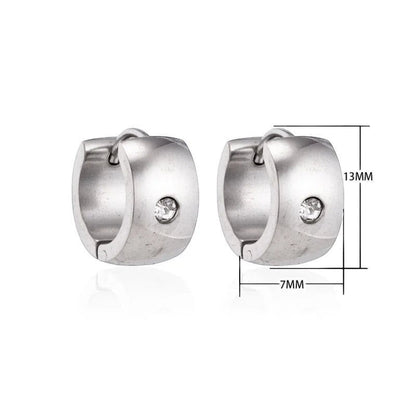 Aramat Jewels silver-coloured wide stainless steel hoop earrings with a clear cubic zirconia stone. Diameter 13mm, width 7mm.