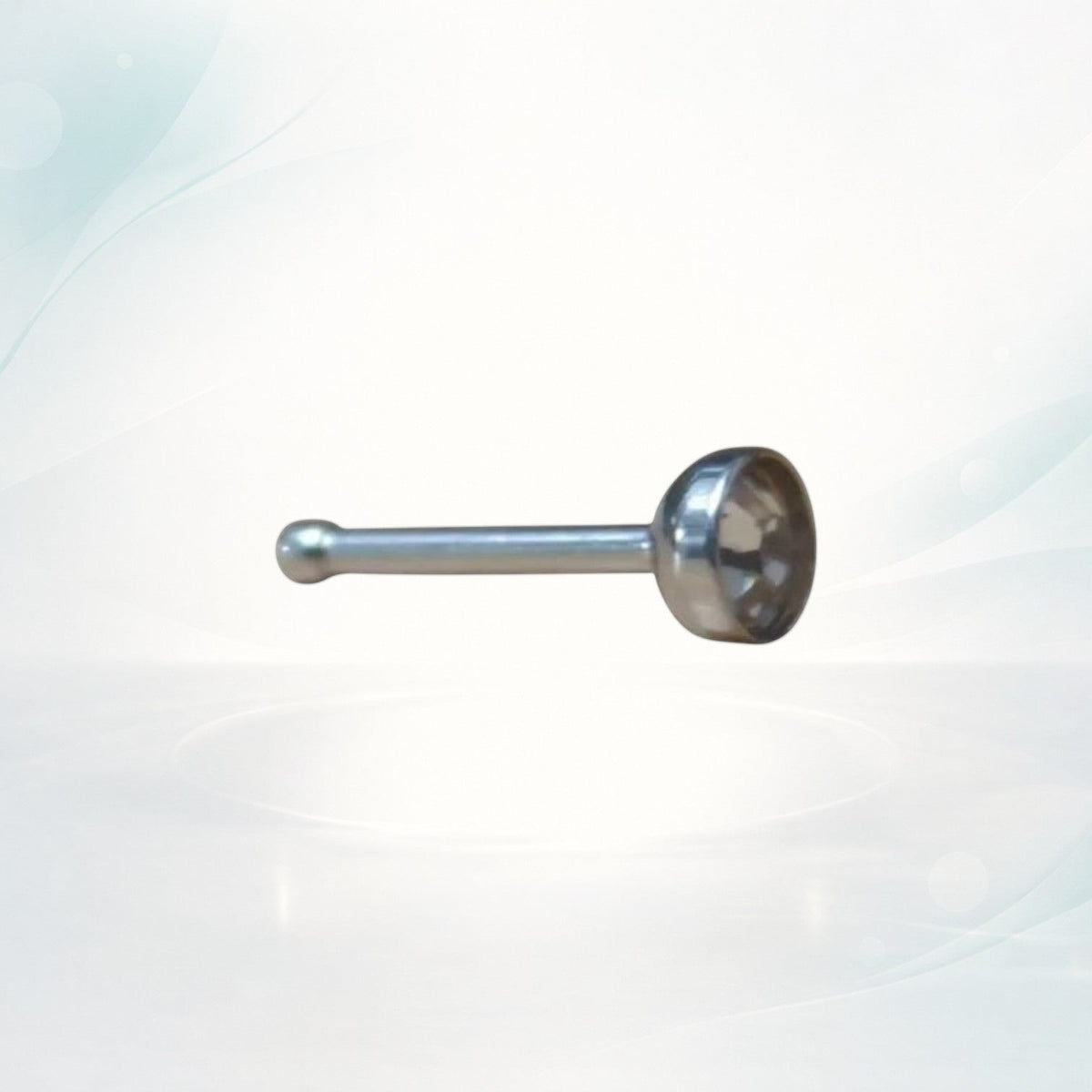 Aramat Jewels silver stainless steel nose stud with a 2mm clear crystal stone, straight design.