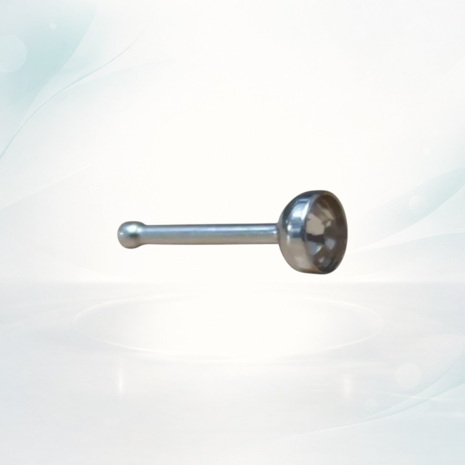 Aramat Jewels silver stainless steel nose stud with a 2mm clear crystal stone, straight design.