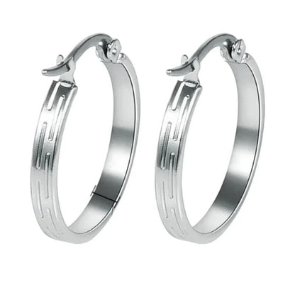 Aramat Jewels silver-tone stainless steel hoop earrings with a subtle striped pattern, 20mm diameter.