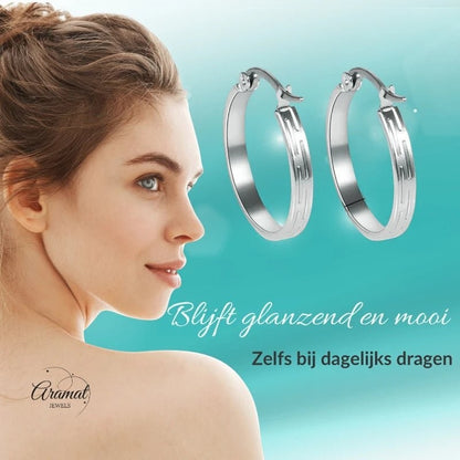 Aramat Jewels silver-tone stainless steel hoop earrings with a subtle striped pattern, 20mm diameter, perfect for daily wear.