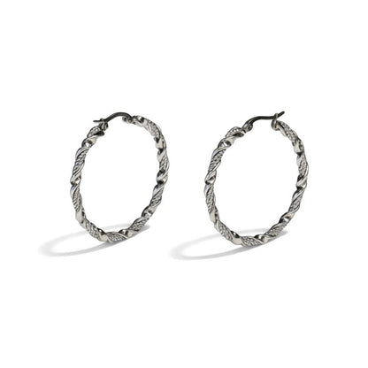 Aramat Jewels silver-tone stainless steel twisted hoop earrings, 30mm or 40mm diameter, 3mm width, with a shiny finish and hinge clasp.
