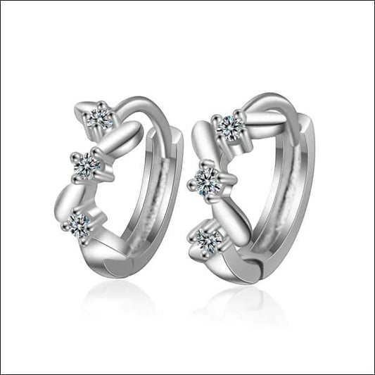 Aramat Jewels silver hoop earrings with zigzag pattern and clear cubic zirconia stones, 12mm.