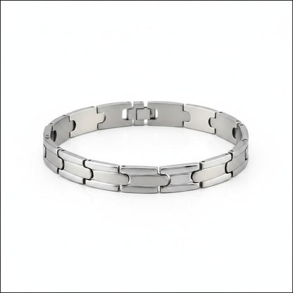 Zilverkleurige Aramat Jewels schakelarmband van 316L chirurgisch staal met een breedte van 9 mm en kliksluiting.