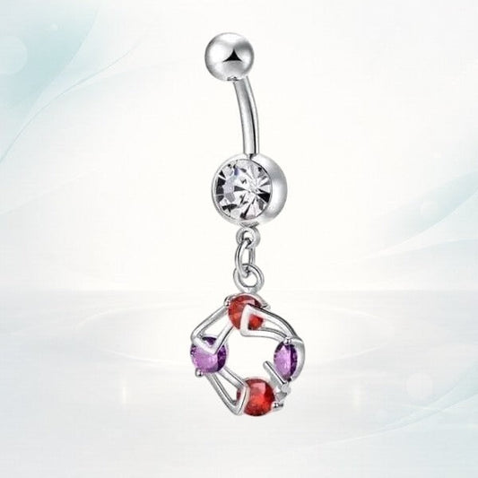 Aramat Jewels silver-tone steel navel piercing with clear, red, and purple cubic zirconia stones.