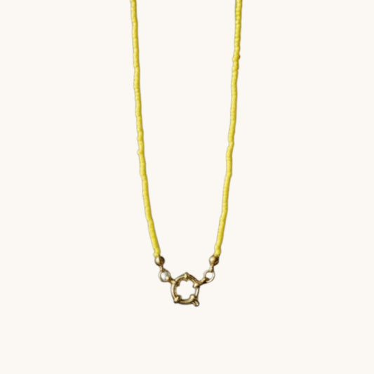 Aramat Jewels yellow beaded necklace with gold clasp, handmade from Rocailles beads and stainless steel.