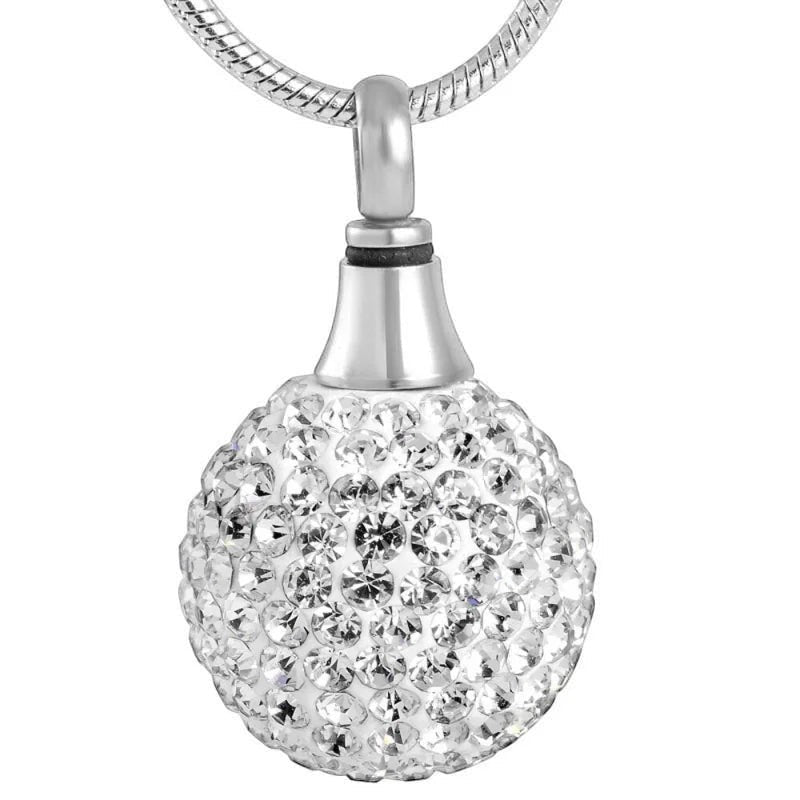 Aramat Jewels zilverkleurige bolvormige ashanger bezet met kristallen, met schroefsluiting. Discreet gedenksieraad zonder ketting.