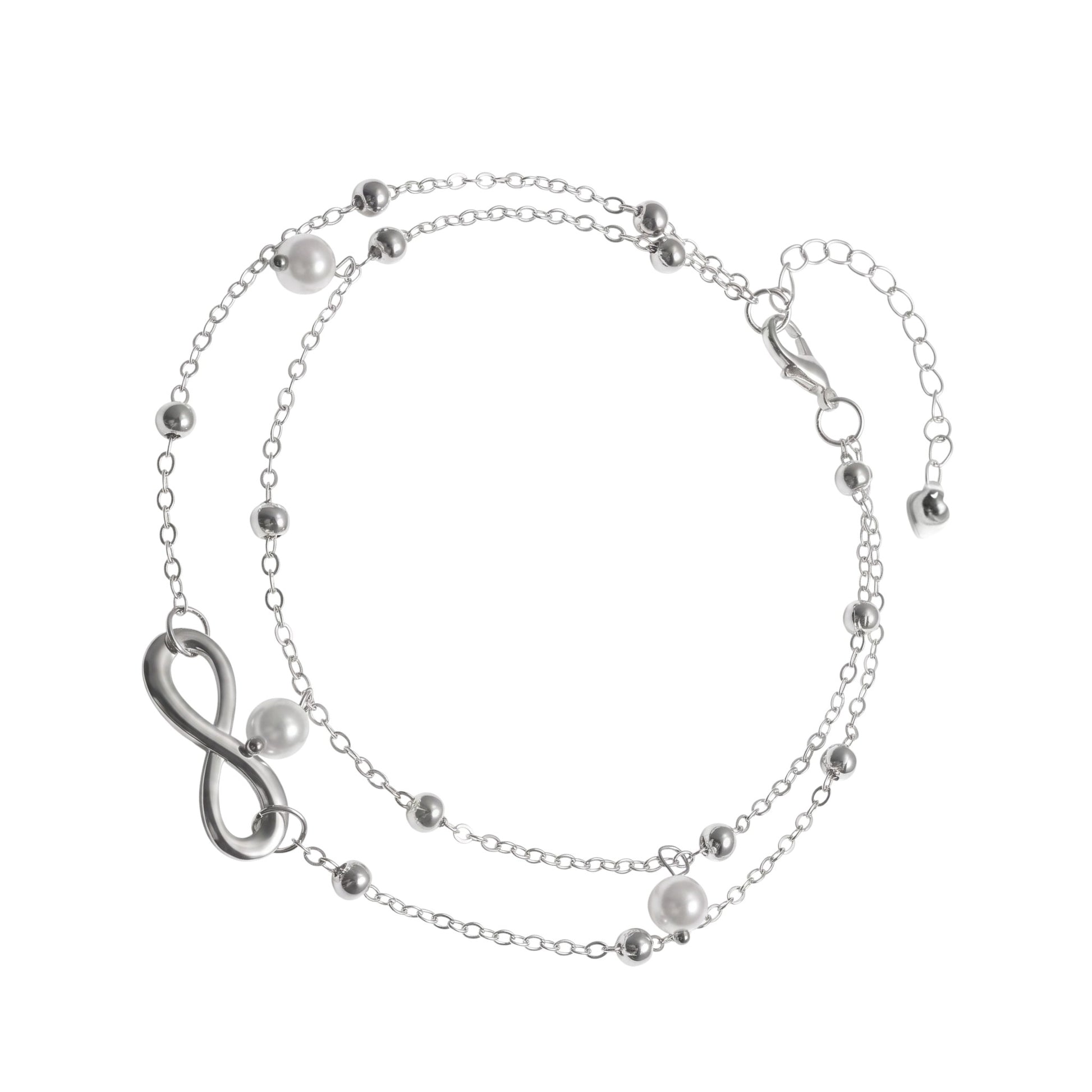 Aramat Jewels dubbel zilverkleurig enkelbandje met infinity teken en witte parels voor een zomerse look.