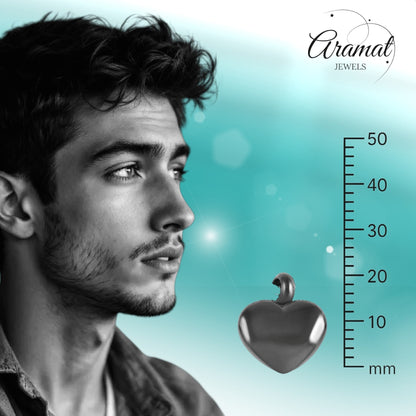 Aramat Jewels® zwarte hartvormige asbedel van 17mm van roestvrij staal aan een zilverkleurige slangenhalsketting.