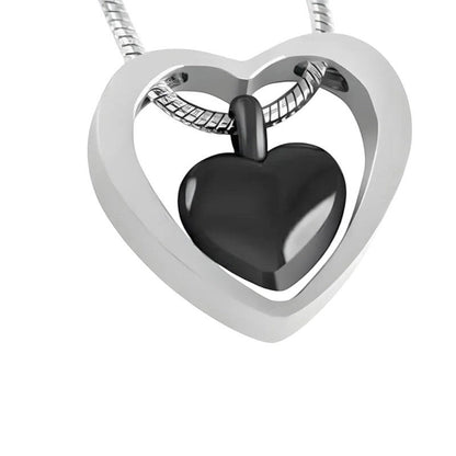 Aramat Jewels® zwarte stalen crematiehanger in hartvorm met een open hart frame. Roestvrij staal.