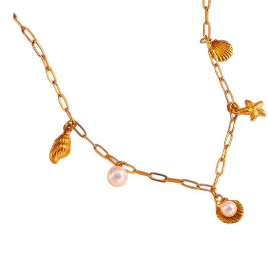 Goudkleurige damesketting met schelp - en parelbedels - ket1165 - 511143 - Halskettingen kopen# - 45cm - alles - Bedelketting