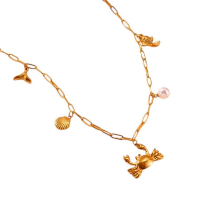 Goudkleurige damesketting met zee - bedels – 45 cm - ket1168 - 511144 - Halskettingen kopen# - 45cm - alles - Bedelketting